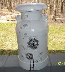Refurbished Milk Can Primed And Painted Adorned With Dollar Store Wall Decals Painted Milk Cans Old Milk Cans Milk Can Decor