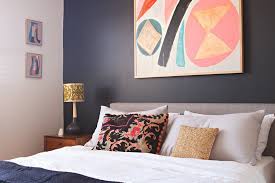 Above a mantel or fireplace is the perfect place to layer pieces. 12 Ideas For Hanging Pictures Over The Bed Creative Ways To Use Above The Bed Apartment Therapy