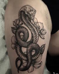 For an additional touch, you can add in a bit of green ink to. Snake Flowers Tattoo By Jacob Kearney
