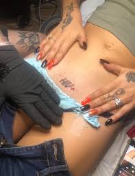 Breast tattoo designs are quite different from tattoo designs on other body parts. Photos Lady Tattoos Hiv On Her Privates To Announce She Has The Virus Yabaleftonline