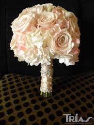 Welcome to destin floral designs, most award winning florist on the emerald coast! Roses And Hydrangeas Bridal Bouquet With Fabric Stem Tie With Pearl And Jeweled Accents Wedding Bridal Bouquets Hydrangea Bridal Bouquet Wedding Bouquets