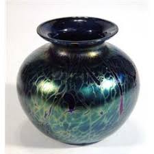 Nowadays, attractive flower holders are utilized to hold flowers in them. Royal Brierley Purple Iridescent Glass Vase 10cm High