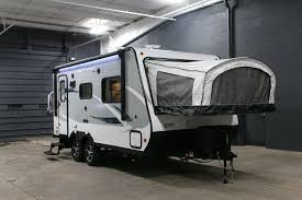 Unique And Fun Hybrid Trailer 2017 Jayco Jay Feather X19h This 20 8 Long 3 665 Lb X1 Hybrid Travel Trailers Lightweight Travel Trailers Lightweight Campers