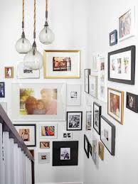 3 Stylish Ways To Display Family Photos Making Joy And Pretty Things By displaying artwork on a white wall you allow the elements showcased to.