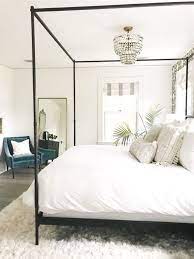 Neutral Bedroom Decor With Modern Four Poster Bed All White Bedroom Remodel Bedroom Master Bedroom Remodel
