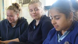 Glen Innes High School "Because of her, we can!" in video and pictures