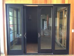 Thinking about installing a glass garage door? From The Exterior Center Doors Slide Open And Each Side Of Doors Is Fixed All Of These Windows Will Remain Just Slider Door Sliding Glass Door Glass Door