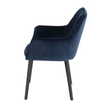 A plush velvet fabric upholsters the seat and backrest. Bronx Blue Velvet Dining Chair