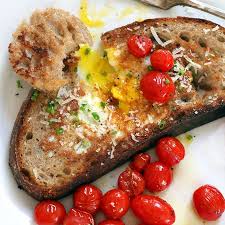 Eggs On A Raft With Sauteed Cherry Tomatoes Recipe In 2020 Cherry Tomatoes Work Breakfast Cooking