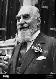 Man with beard smoking cigar Black and White Stock Photos & Images