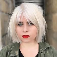 Past shoulders hair with choppy bangs. Platinum Choppy Bob With Parted Fringe Bangs And Undone Straight Texture The Latest Hairstyles For Men And Women 2020 Hairstyleology
