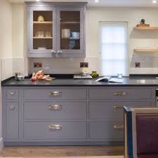 Branches in cheadle hulme, cardiff, thurrock, chatham, woodford & croydon. A Bespoke In Frame Kitchen With Grey Cabinetry Chrome Cup Handles And African Honed Black Granite Grey Painted Kitchen Grey Kitchen Cupboards Kitchen Redesign