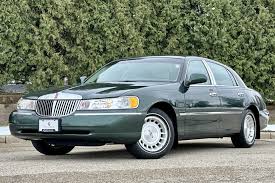 Image result for Light Parchment Gold 1999 Town Car