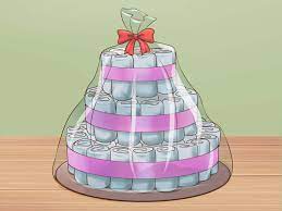 Learn how to make an adorable and practical diaper cake. 3 Ways To Make A Diaper Cake Wikihow