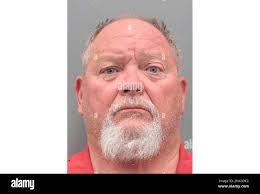 This Henderson Detention Center photo shows Richard John Devries following  his arrest and booking