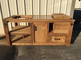 Wood makes it easy to build the main structure of your grilling station, then you can strong it with bricks or cinder blocks: Build A Barbecue Grill Table Diy Projects For Everyone