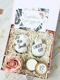 If you're stuck wondering what the appropriate gift is for your sister, brother, or friend's engagement, luckily there are a ton of options (including funny ones!) that will make the happy. Engagement Gift Box Engagement Gift For Couple Couples Engagement Gift Engagement Gift Basket Engagement Gift Bridal Shower Gift In 2021 Engagement Gifts For Couples Engagement Gifts Engagement Gift Boxes