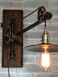 Industrial Lighting Small Vintage Pulley By Trishandtomvintageco Industrial Light Fixtures Vintage Industrial Lighting Industrial Lighting Design