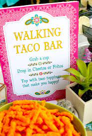 Easy to make and easy to serve, a taco bar is a great party/entertainment feature you can use to feed your party guests. Easy Taco Bar Ideas For Walking Tacos That Wow Party Guests