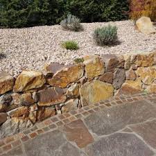 Next, fill the hole with concrete and let it dry overnight. Retaining Walls Cinder Blocks Archives Colorado Materials Landscape Products Colorado