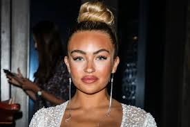 Towie’s Ella drops her coat to reveal lacy lingerie