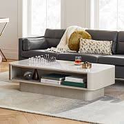 A coffee table is a low table designed to be placed in a sitting area for convenient support of beverages, remote controls, magazines, books (especially large, illustrated coffee table books), decorative objects, and other small items. Low Coffee Table