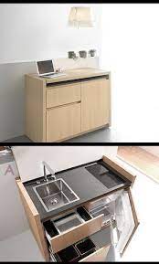 You may let your kitchen staff get away with wearing shoes they've picked out from their favourite brands. Mini Kitchen Compact And Hyper Equipped By Kitchoo Http Www Trendir Com Archives 005624 Html Tiny Kitchen Tiny House Design Small Kitchen