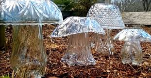 Turns out, with a tiny bit of diy, you can cover almost all your residence and garden needs using only the dollar shop! People Are Upcycling Old Glassware Into Stunning Glass Garden Mushrooms
