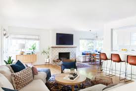 Monochromatic slate tile spans the entire firewall on this residing space—the proper foil for the putting flooring and total gentle and vibrant house. 10 Chic Fireplace Tile Ideas Tile Designs For Your Fireplace Surround