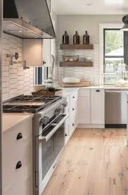 Its rustic beauty is mostly defined by wood, stones beadboards, for example, are the humble beginnings of farmhouse backsplash until it evolves into more modern designs. 37 Modern Farmhouse Kitchen Cabinet Ideas Sebring Design Build