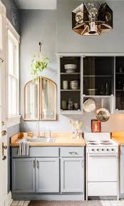 For any small room (a kitchen or otherwise), getting organized is essential. Drama Drama Drama 13 Kitchens With Scene Stealing Lighting Kitchen Remodel Small Kitchen Design Small Small Space Kitchen