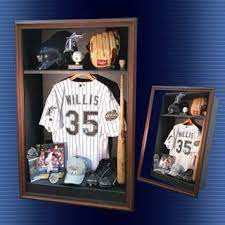 Spread the jersey onto a table and measure the height and width, adding 1 to 2 inches all the way around as you prefer. At The End Of The Season Shadow Box Justin Jordans Stuff For Decoration In Thier Room Baseball Shadow Boxes Baseball Bedroom Baseball Room