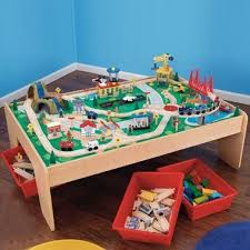 Passengers wave to the smiling townsfolk as they zip by. Kidkraft Waterfall Mountain Train Table Set Free Shipping Wooden Train Set Table Wooden Train Set Train Set Table