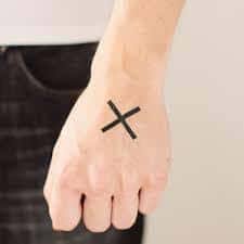 The arrow represents moving forward, motivation, getting on with life. What Does X Tattoo Mean Represent Symbolism