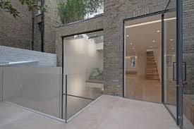 These basement door ideas will wow guests before they even walk in. Minimal Windows In Luxury Basement Renovations Minimal Windows