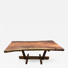 George nakashima model 202 walnut dining table designed for widdicomb furniture company as part of his origins line manufactered between 1959 to 1963. George Nakashima George Nakashima Style Conoid Dining Table With Free Edge Top