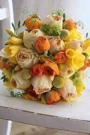 Your flowers orange wedding stock images are ready. Orange And Yellow Bridal Bouquet Orange Wedding Bouquet Yellow Flower Arrangements Wedding Bouquets