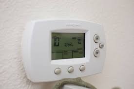 Once removed, turn the thermostat over and insert 2 fresh aa batteries, and then reinstall the thermostat on the wallplate. How To Change A Honeywell Thermostat Battery Step By Step Guide Upgraded Home