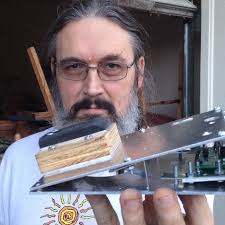 Does 2% of the solar system's mass include the Kuiper belt?