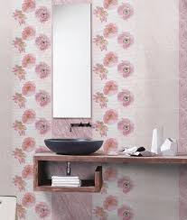 A contemporary bathroom done in white and with wood look tiles over the bathtub to highlight this. Rascaniya Wall Tiles Johnson Distributor Dealer Shop Kottayam Thiruvalla Kumbanad Kozhencherry Chengannur Kerala