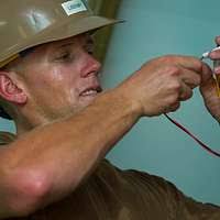 Steel Worker Constructionmen Kaysie Hall, a Navy Reservist
