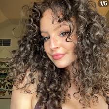 What hair salons in Greenville specialize in haircuts for thick curly hair  and dark hair colors?