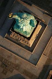 Get a 27.000 second aerial view of statue of stock footage at 23.98fps. A Fabulous Picture Of Lady Liberty Taken From Overhead New York City Statue York