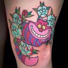 22 Awesome Cheshire Cat Tattoos Catster Cheshire Cat Tattoo Cat Tattoo Cat Tattoo Small