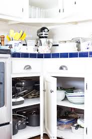 Organizing your pots and pans can be a daunting task to tackle in your kitchen, because they are all so big and unwieldy. Kitchen Storage Ideas Cookware Utensils On Sutton Place