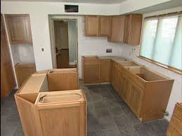 How To Hang Kitchen Cabinets With Some Flush To Appliances Installing Kitchen Cabinets Installing Cabinets Diy Kitchen