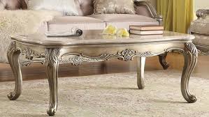 It retains the distressed character and simple lines of the original. Silver Gold Coffee Table