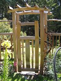 Types Of Garden Gates Designalls Garden Gate Design Garden Arbor With Gate Wooden Garden Gate