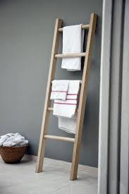 Wooden Towel Ladder In Both Rustic As Well As In Modern Bathroom Ladder Towel Racks Towel Ladder Bathroom Ladder