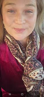 Fixing the eye makeup in this photo